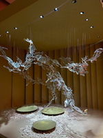 Lustres suspendus de luxe en forme d'éclosion d'art, éclairages décoratifs faits à la main en forme de glace pour escaliers et halls