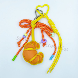 جلد صناعي ملون محشو على شكل كرواسون شكل شريط نايلون شكل خبز دانتيل - Product Image 5