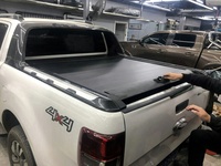 Couvercle rigide rétractable personnalisé de rouleau de couverture de lit de camion de tonneau d'alliage d'aluminium pour le canon de Nissan Navara NP300 Ssangyong Musso GWM