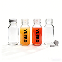 Vente en gros de bouteilles en verre carrées françaises de 60 ml, 2 oz, 30 ml, mini bouteilles en verre pour jus de gingembre avec bouchon à vis en aluminium pour boisson énergisante