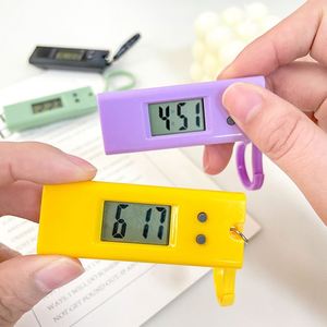 Dropshipping Shopify Reloj electrónico colgante de pared en forma de trapezoide para que los estudiantes se utilicen en el escritorio un reloj despertador - Product Image 3