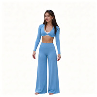 Ensemble de leggings de yoga taille haute à jambe large et hauts de sport courts torsadés, personnalisés, recyclés, biodégradables, anti-humidité, extensibles dans les 4 sens
