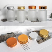 Bouteille d'emballage médical pilules de médecine en verre transparent givré 40ml 60ml 80ml Pharmaceutica Capsule bouteille couvercle en métal 30ml 50ml