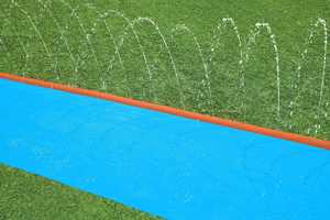 Toboggan aquatique gonflable écologique en PVC pour l'extérieur, équipement de jeu aquatique d'été pour la cour - Product Image 4