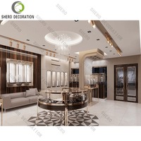 Vitrine de présentation de bijoux en verre avec éclairage LED, design intérieur de magasin de bijoux de luxe sur mesure