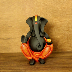 Statue moderne en résine du dieu Ganesha assis |   Finition Noir Orange |   Idole décorative artisanale pour le bureau à domicile |   Cadeau spirituel |   Nirmala - Product Image 2