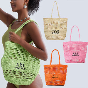 Bolso de <span class=keywords><strong>mano</strong></span> de paja tejida <span class=keywords><strong>a</strong></span> <span class=keywords><strong>mano</strong></span> con logotipo bordado personalizado, bolso de playa de malla de ratán hueco, bolso de <span class=keywords><strong>mano</strong></span> de verano para exteriores - Product Image 1