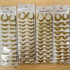 ต่างหูไทเทเนียมชุบทอง18K สำหรับผู้หญิงดีไซน์ทันสมัยเป็นมิตรกับผิวสำหรับธุรกิจขายคืน - Product Image 1