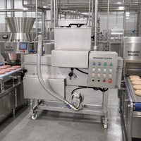 Machine à enrober les produits en panure pour la production de nuggets de poulet, filets de poisson, galettes de burger et autres produits en panure dans les usines agroalimentaires