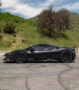 ชุดแต่งคาร์บอนไฟเบอร์สำหรับ Ferrari SF90 รุ่นอัพเกรด 1016-Style ประกอบด้วยลิ้นหน้า สเกิร์ตข้าง สปอยเลอร์ ดิฟฟิวเซอร์ สภาพใหม่ - Product Image 3