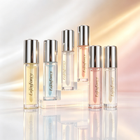 Huile à lèvres EnjoyFancy en tube transparent avec capuchon argenté, enrichie en vitamines C et E, hydratante et repulpante, gloss à lèvres multi-tons, format voyage.