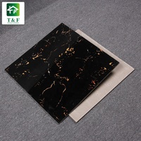 Carrelage de Sol en Porcelaine Poli Émaillé Noir et Or Effet Marbre Design Floral 600x600