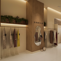 Présentoir en bois personnalisé de luxe léger pour vêtements pour femmes Mobilier de magasin suspendu avec étagères à panneaux de luxe