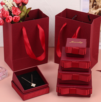 Boîte à bijoux rouge portable haut de gamme en gros, en stock, avec nœud en ruban, logo personnalisé, couvercle amovible, boîte cadeau pour montre, boîte rigide