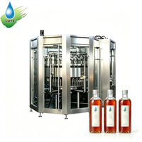 Machine de remplissage à contre-pression industrielle 4000-10000 BPH à 40 têtes pour bouteilles en verre/plastique, boissons et eau automatiques