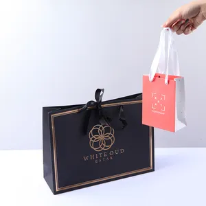 China Factory Price Custom hot stamping Black color paper bag with ribbon handle sealing