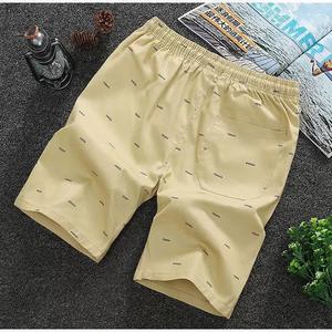 กางเกงขาสั้นลำลองผู้ชายสำหรับฤดูร้อน ระบายอากาศ แห้งเร็ว เหมาะสำหรับใส่ไปชายหาด มีกระเป๋า ผ้าทอ ลายเรียบ เอวกลาง ยางยืดรัดเอว ไซส์ <span class=keywords><strong>6XL</strong></span> - Product Image 3