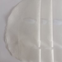 Masque facial non tissé en fibre de Lyocell, haute absorption d'eau, 32 g/m², tissu exfoliant pour soins de la peau