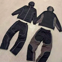 Survêtements noirs personnalisés pour hommes, coupe-vent en nylon avec bandes réfléchissantes, capuche et pantalon à cordon de serrage pour sports décontractés