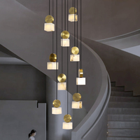 Lustre LED de luxe tout en cuivre, nouveau style chinois, villa duplex, escalier, espace ouvert, éclairage de salon, importé du Moyen-Orient