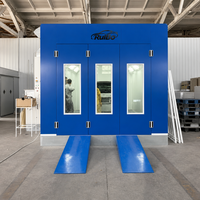 Cabine de peinture automobile RuiBo, bleu royal, trois portes, base galvanisée surélevée, rampes bleues, unité d'air latérale