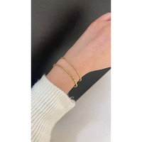 Bracelet en or 18 carats tissé en macramé soigné avec moissanite, texture artisanale spéciale, ornement doré élégant et tendance pour toutes les saisons