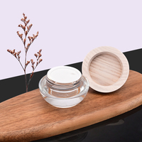 50g Color claro Claro Vidrio transparente Frasco cosmético Ceniza Tapa de madera Tapa de plástico Capacidad para el embalaje del cuidado de la piel