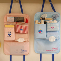 Sac de rangement mural multifonctionnel à motif de dessin animé avec sangle réglable et plusieurs poches pour siège arrière de voiture