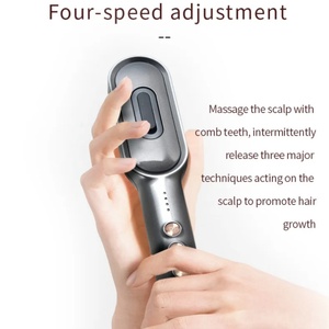 Cepillo Masajeador Eléctrico Portátil Inalámbrico con Luz LED de 4 Colores para el Crecimiento del Cabello y Masaje del Cuero Cabelludo - Product Image 3