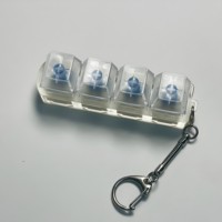 Porte-clés tendance en acrylique avec impression UV et 4 touches mécaniques LED, idéal comme outil de relaxation et de décompression
