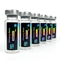 Étiquettes autocollantes personnalisées découpées sur mesure pour flacons PET holographiques de 10 ml avec texture papier de luxe pour l'image de marque cosmétique haut de gamme