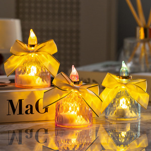 2026 New Christmas LED Bow Candle Lamp Wholesale Plastic Simulation Flame <b>Light</b> Battery Powered Small Night <b>Light</b> - Product Image 1