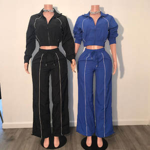 Fabricant Vêtements de sport tendance à manches longues Veste courte zippée Pantalon baggy Ensemble deux pièces Survêtements en nylon pour femmes avec logo personnalisé - Product Image 2