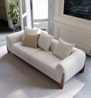 NOVA Weißes Wohnzimmer Lounge Zweisitzer Sofa Ecksofa aus Lammfellstoff Skandinavische Polstermöbel mit Massivholzbeinen