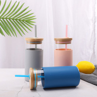 Nouvelle bouteille à boire personnalisée de 17oz écologique, bouteille d'eau en verre Borosilicate réutilisable avec manchon en silicone/couvercle en bambou