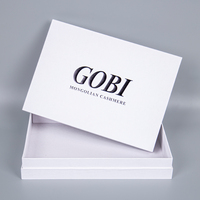 Boîtes d'expédition personnalisées en papier recyclable de qualité supérieure avec gaufrage et pelliculage mat, fermeture magnétique et ruban