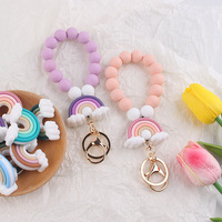 Neu Eingetroffenes Silikon-Regenbogen-Perlenarmband Schlüsselanhänger für Frauen Elastisches Armband Schlüsselring Autoschlüsselhalter Rucksack-Anhänger