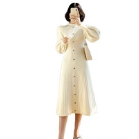 Automne hiver femmes bouffée à manches longues robe en tricot col montant couleur unie pull décontracté a-ligne Midi longue robe