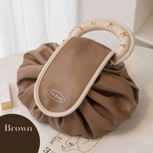 Sacs à cosmétiques ronds pour femmes, imperméables, organisateurs, sacs à cosmétiques en PU avec cordon de serrage - Product Image 1