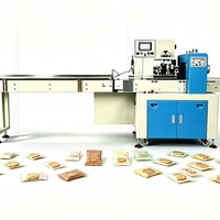 Machine d'emballage horizontale automatique pour barres de chocolat, gâteaux, biscuits et autres produits en forme de coussin