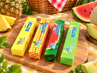 Vente en gros directe usine : Mini jouet souple en PU en forme de bâton de beurre à thème fruité, réaliste, à remontée lente, anti-stress, OEM ODM