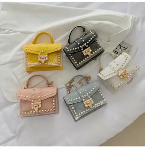 Summer Fashion <strong>Clear</strong> Pvc <strong>Handbag</strong> Girls Rivet square Wholesale Transparent Pvc <strong>Handbags</strong> for Women - Product Image 1