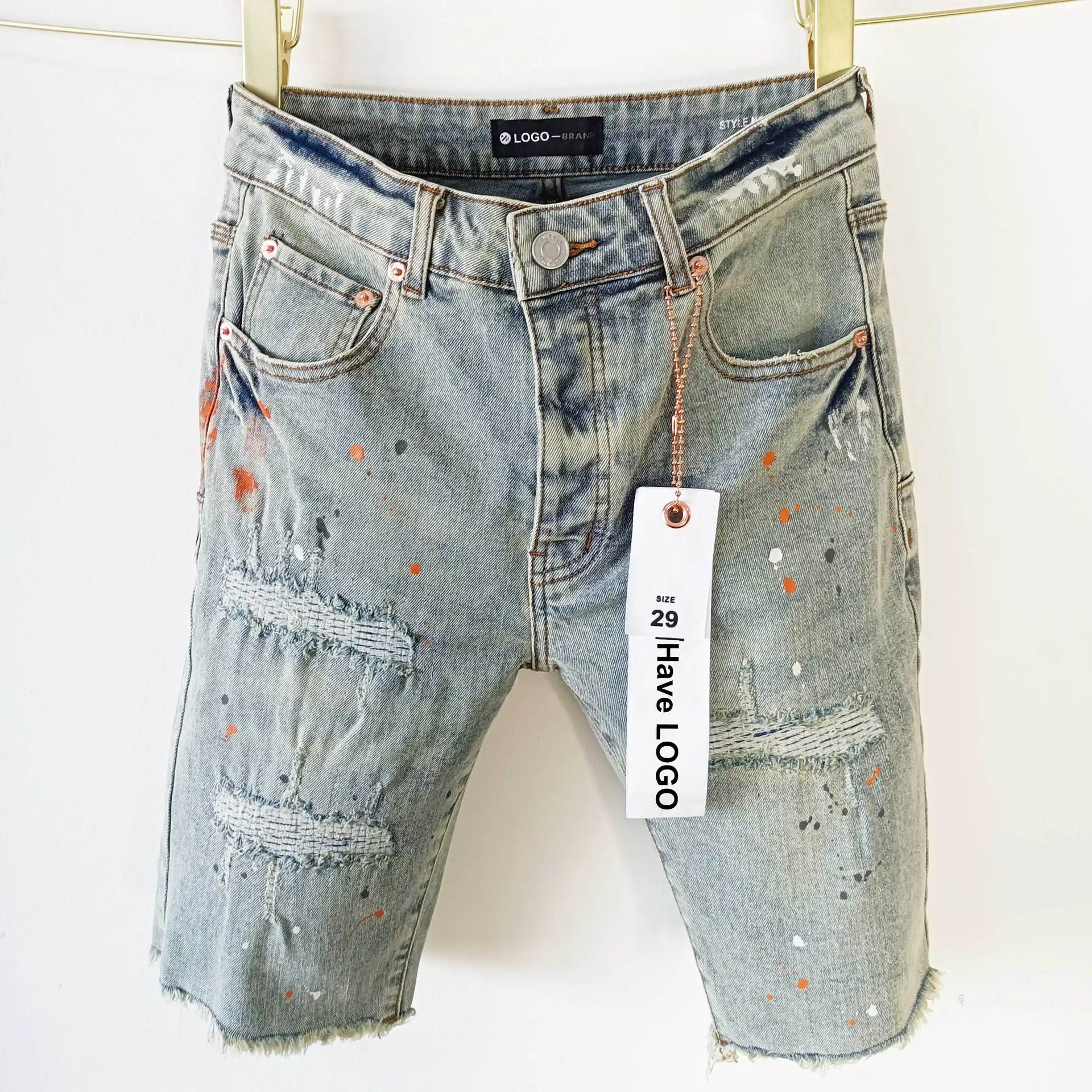Фиолетовый бренд продает американские рваные джинсовые шорты больших размеров в стиле хип-хоп