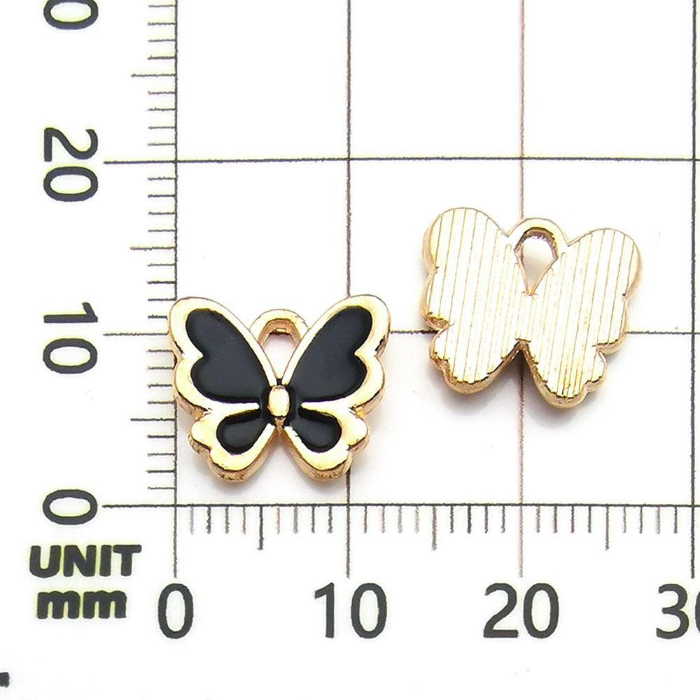 Un papillon noir dégoulinant d'huile - 0,6 g - 13*11 mm - 11865