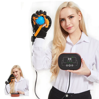 Gants robotiques de qualité supérieure Dispositif de rééducation électrique des mains pour les patients en hémiplégie Massage électrique des doigts