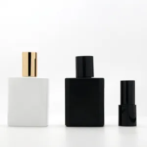 Customized 50ml rectangle in stock black white short square shape empty refillable glass perfume bottle with screw gold top