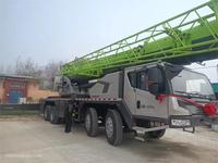 Grue tout-terrain Zoomlion 25 tonnes en promotion avec capacité de levage pour le port et le chantier, levage de charges lourdes