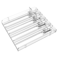 Poussoir pour présentoir à cigarettes, présentoir à cigarettes avec plateaux poussoirs pour paquets