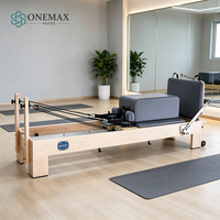 Lit de Pilates Reformer de qualité studio ONEMAX avec revêtement en cuir microfibre, éponge 45D, options multicolores pour usage commercial