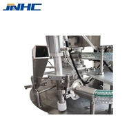 Machine de remplissage et de bouchage automatique pour liquides, pâtes et boissons (Ketchup, Gelée, Lait de soja, Huile moteur) en poches à bec verseur verticales